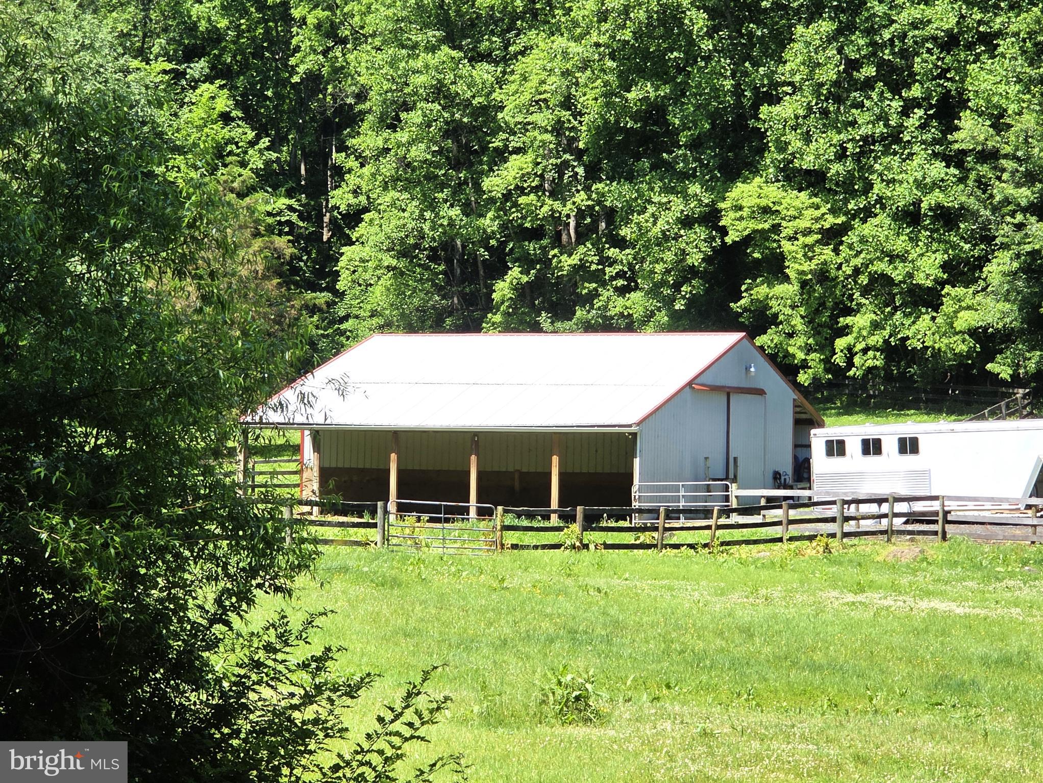 2157 North Cooper Road Whiteford, MD 21160 - Photo 6 of 11 Barn w/ 6 stalls, tack room, hay/feed room & loft