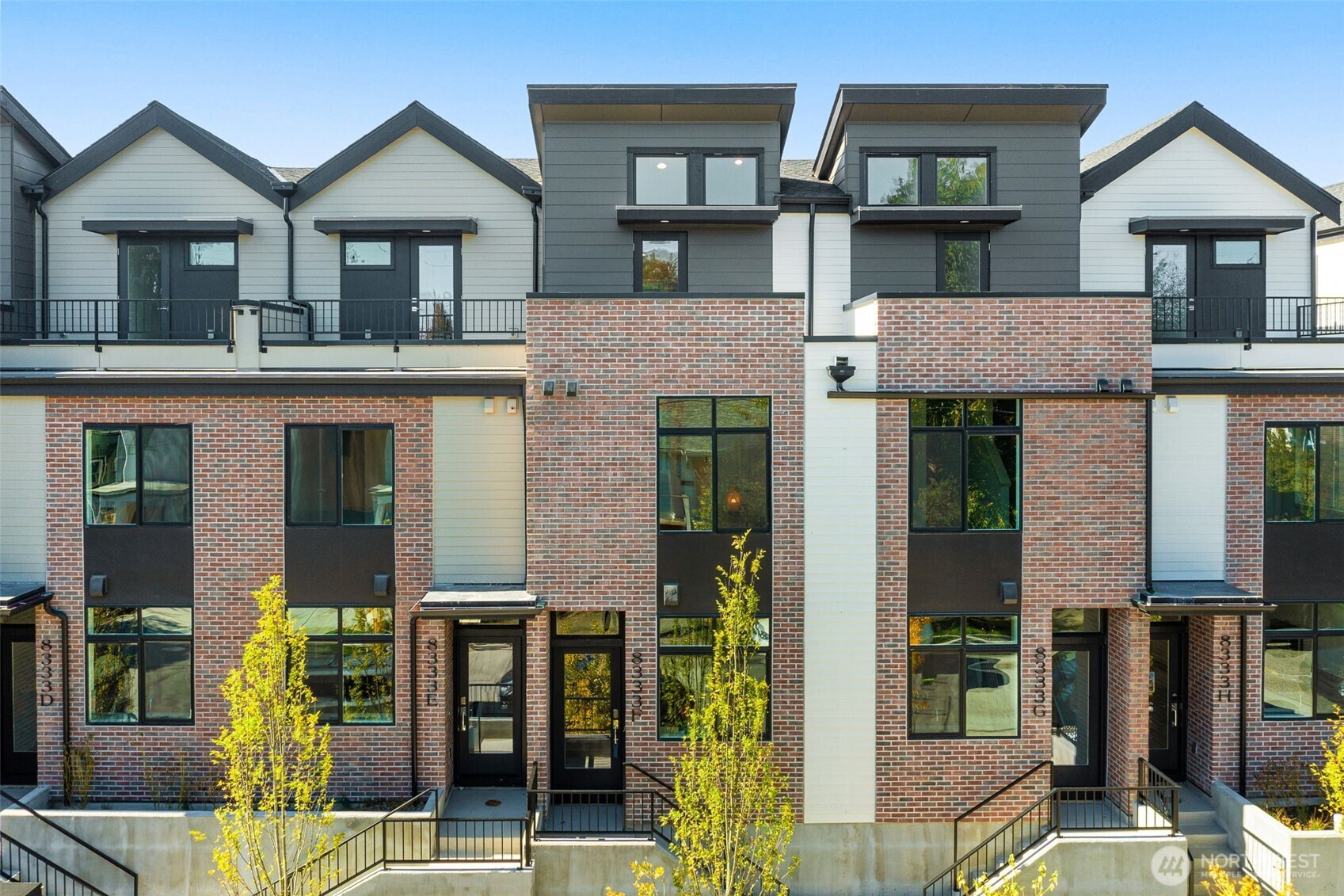 front view of a house with a small yard