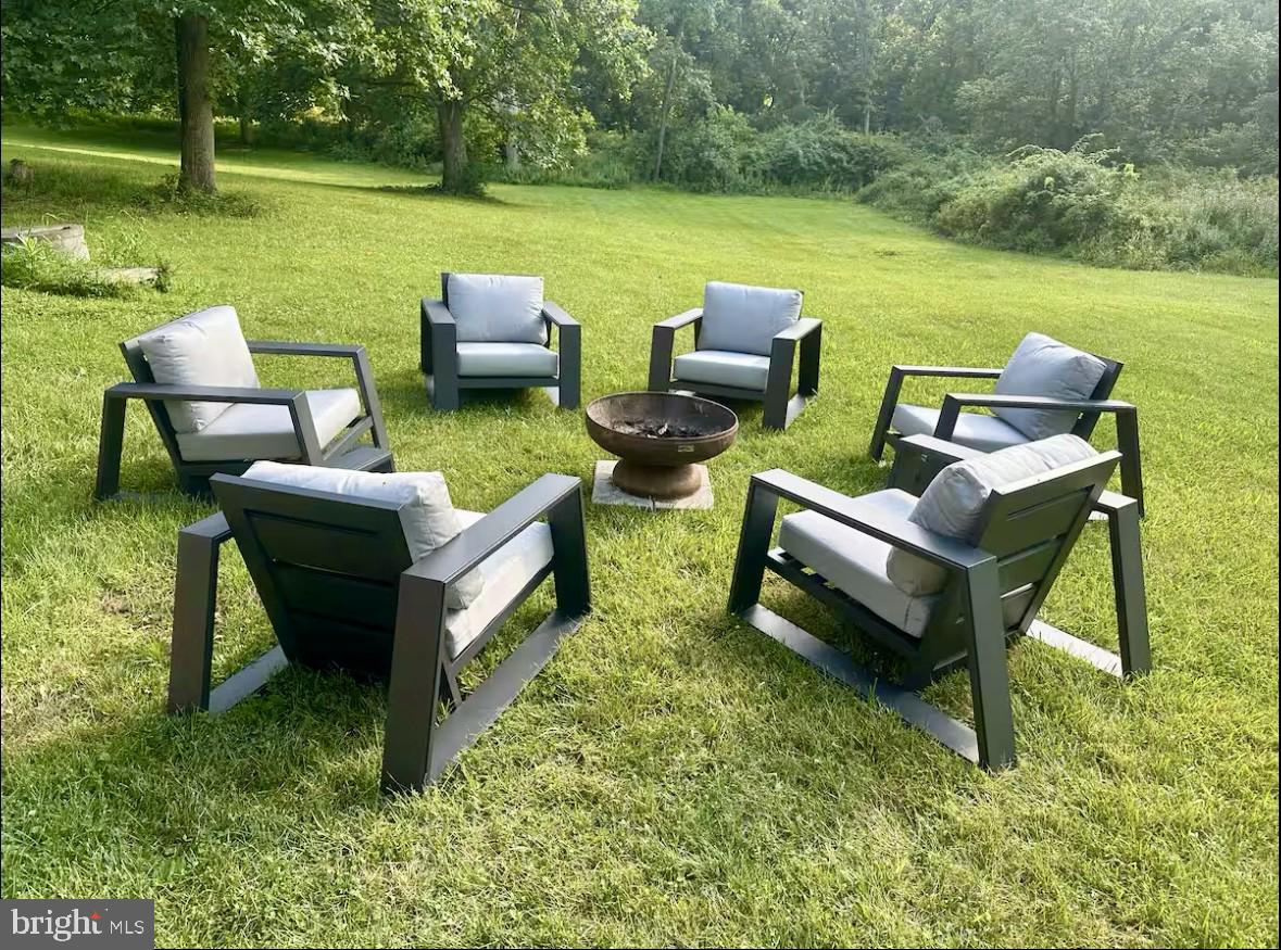 411 Whiskey Still Road Linden, VA 22642 - Photo 18 of 31 a view of a patio with lawn chairs