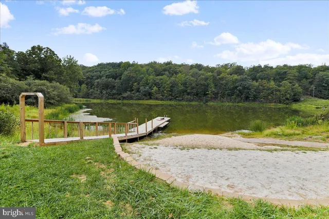 a view of a lake with a big yard