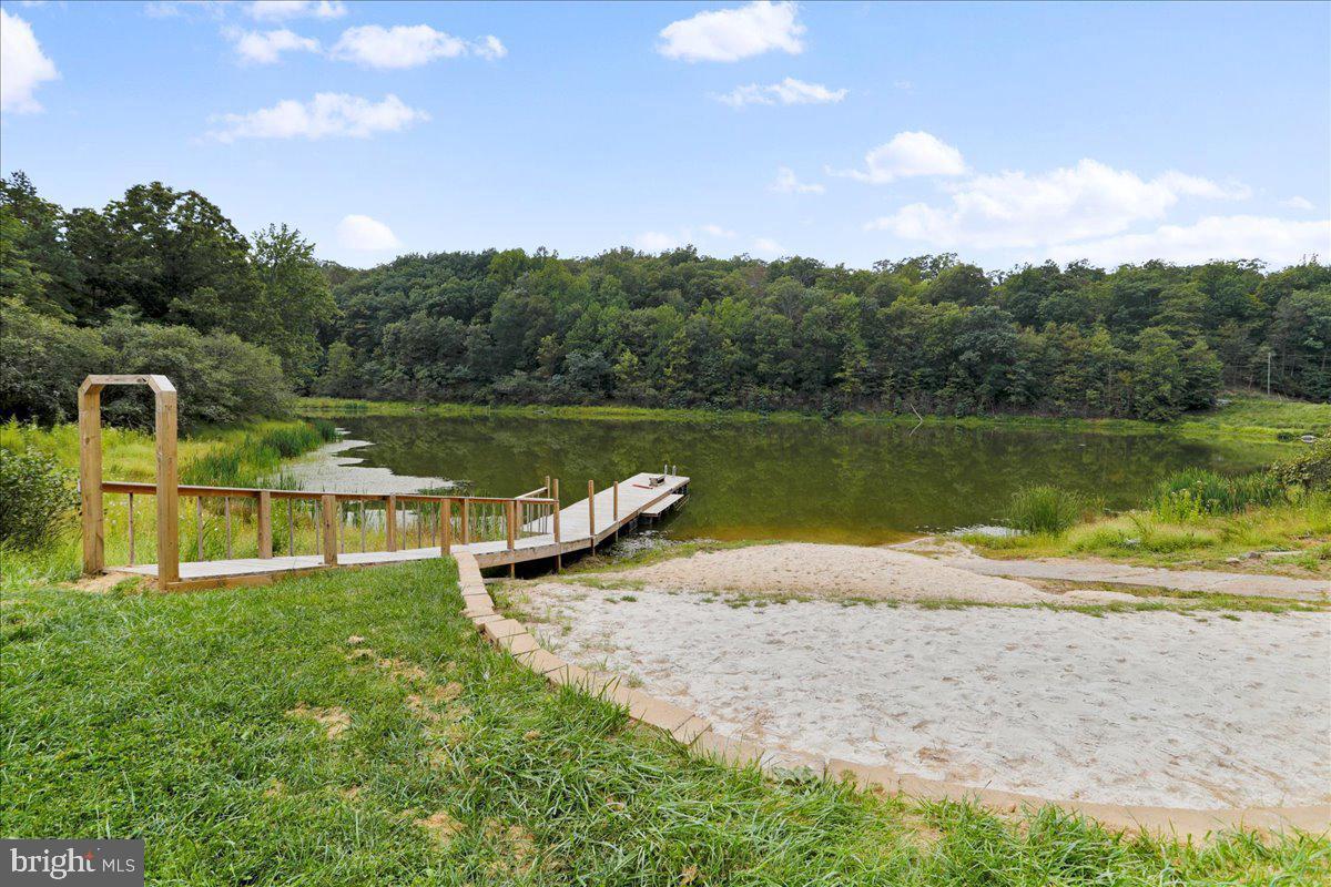411 Whiskey Still Road Linden, VA 22642 - Photo 30 of 31 a view of a lake with a big yard