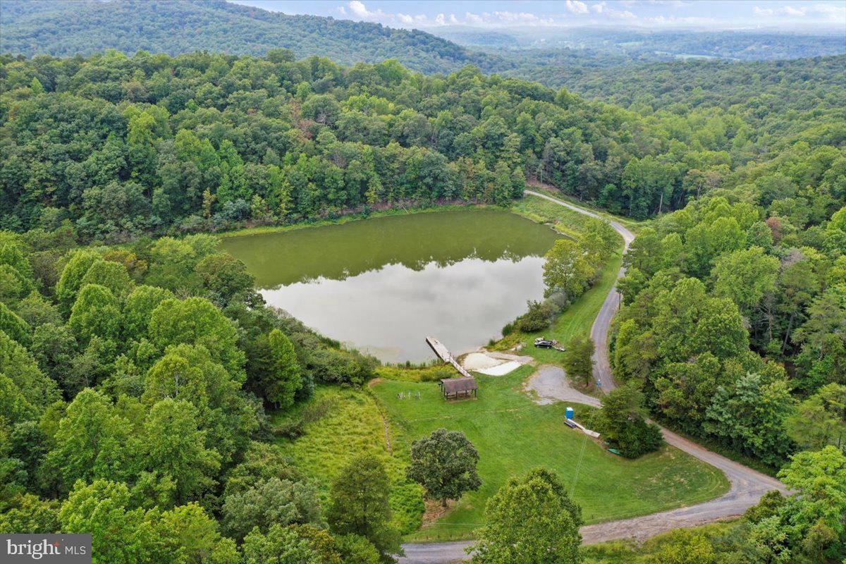 411 Whiskey Still Road Linden, VA 22642 - Photo 31 of 31 an aerial view of a house with a yard
