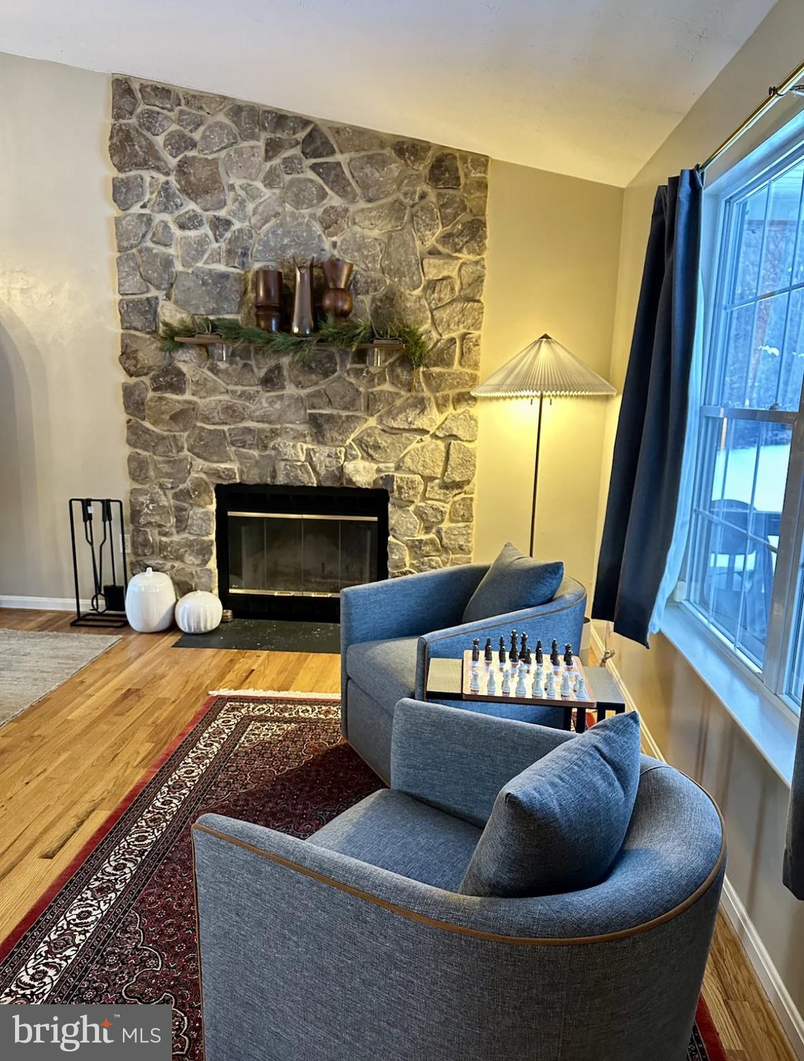 411 Whiskey Still Road Linden, VA 22642 - Photo 5 of 31 a living room with furniture and a fireplace