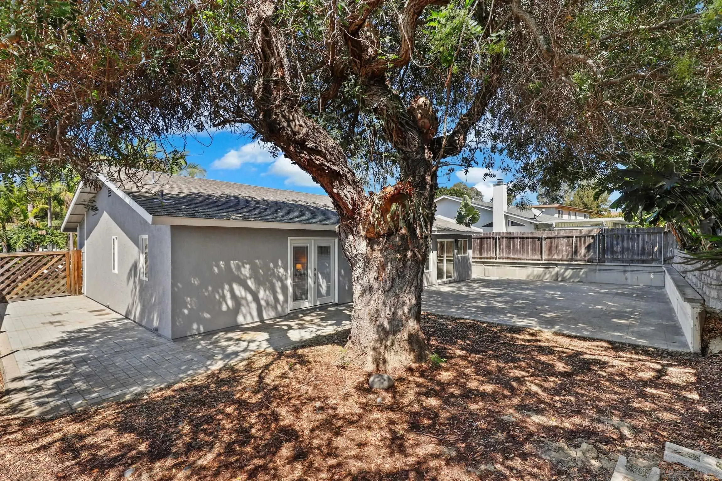 1725 Deerfield Road Encinitas, CA 92024 - Photo 30 of 31 a front view of a house with a tree