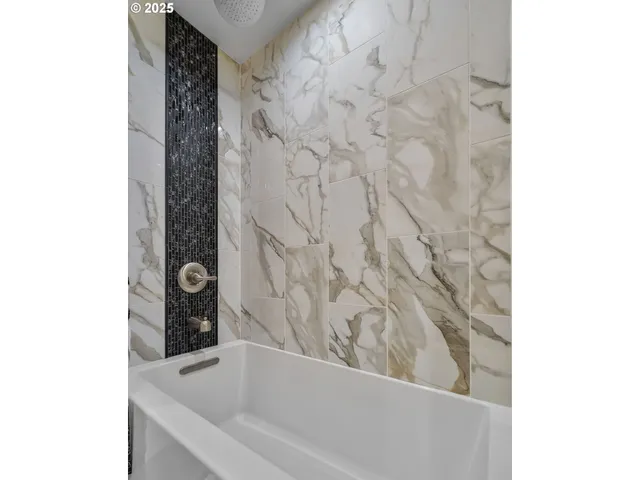 a bathroom with a bathtub