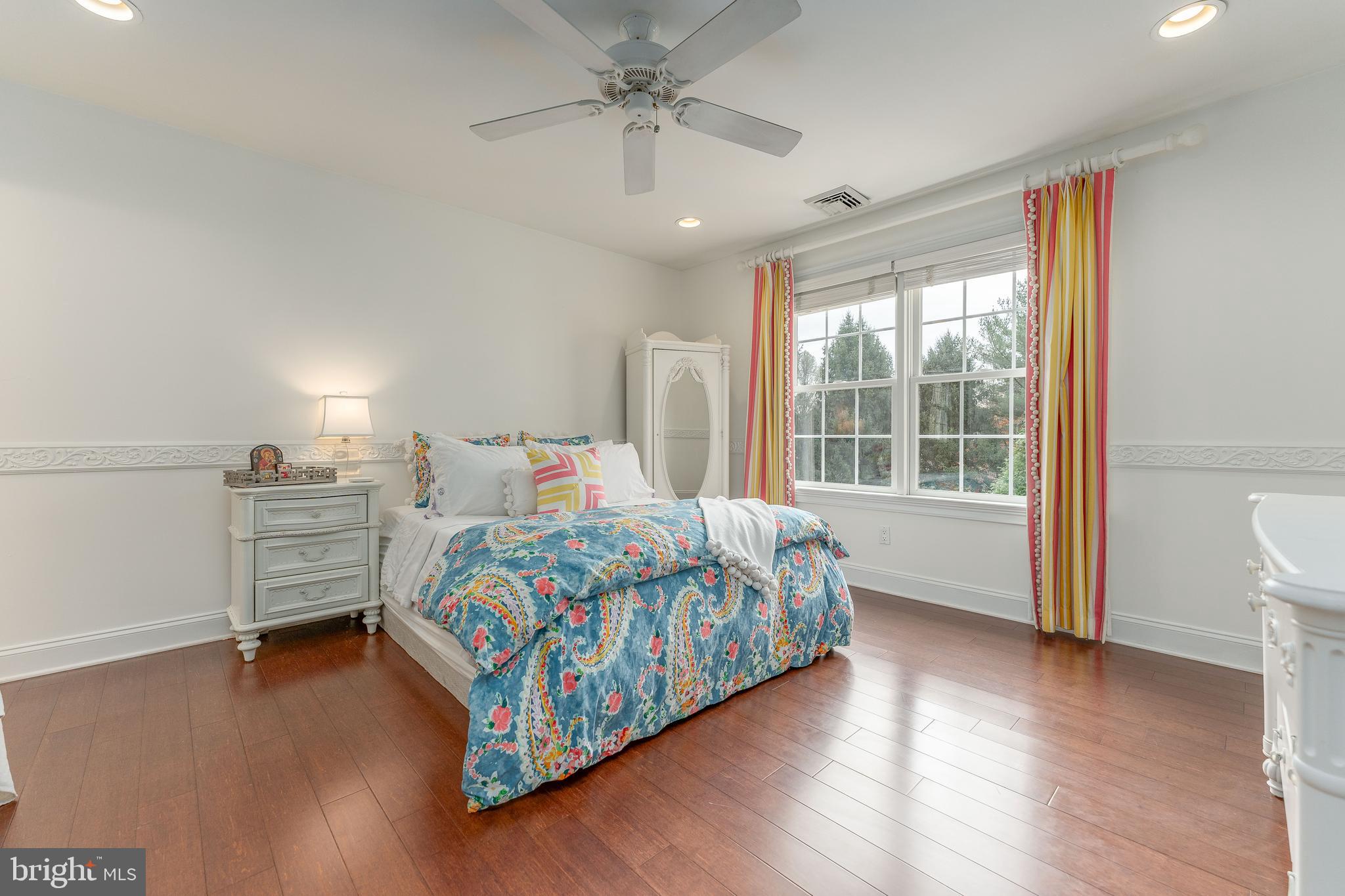 528 Old Forge Road Media, PA 19063 - Photo 41 of 84 a bedroom with a bed and wooden floor