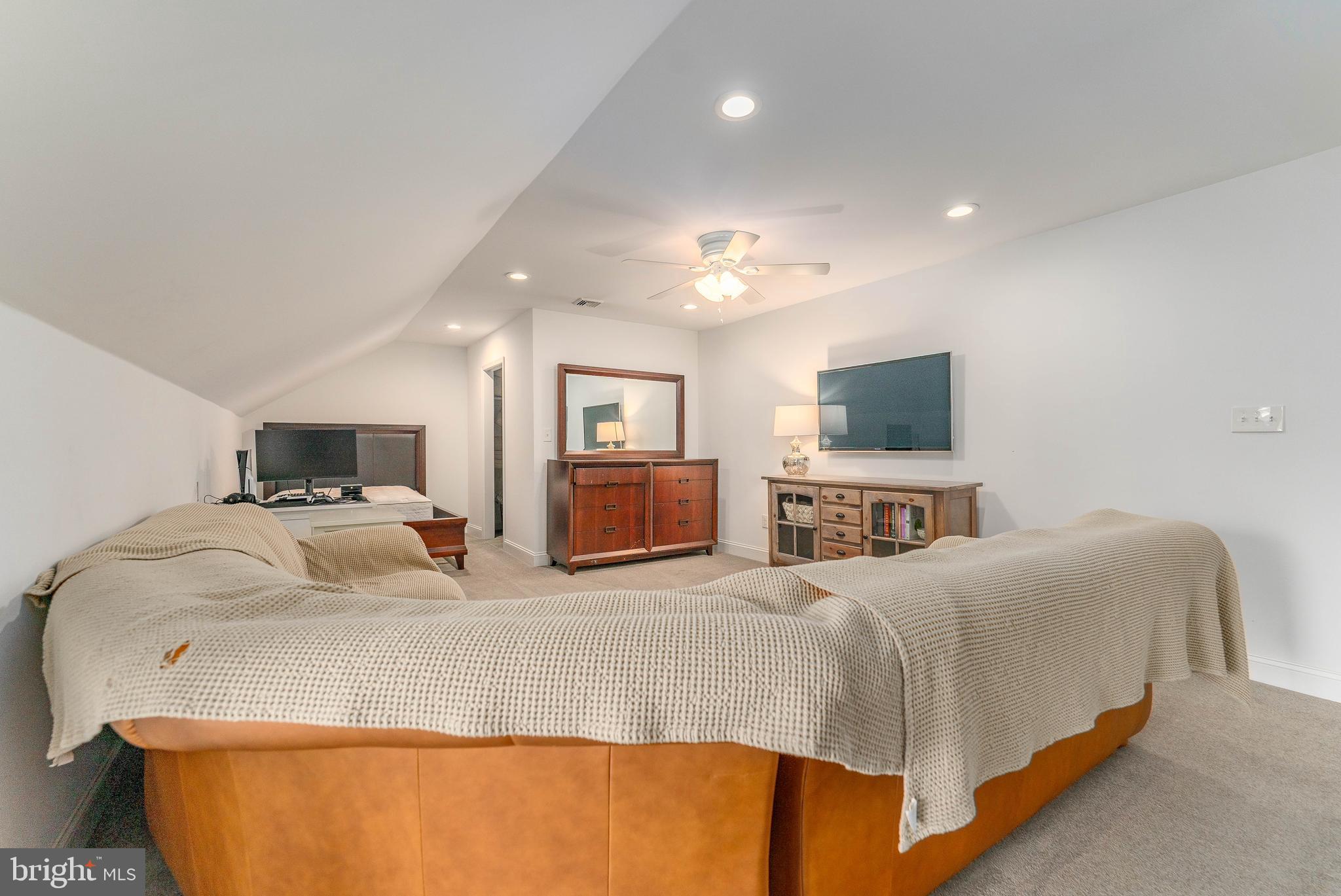 528 Old Forge Road Media, PA 19063 - Photo 54 of 84 a bedroom with a large bed and a tv