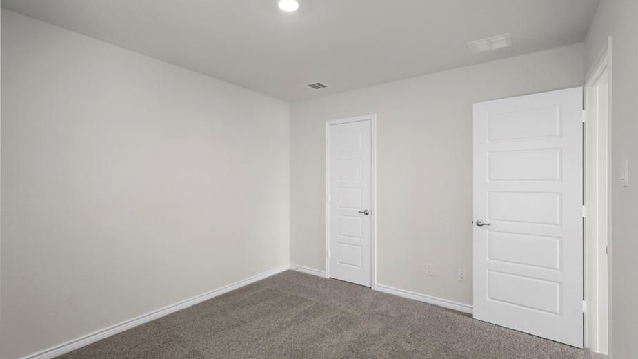 424 Epiphany Lane Lavon, TX 75166 - Photo 23 of 27 Room featuring plush gray carpet flooring, light gray wall paint, and recessed ceiling lighting