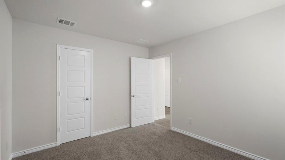 424 Epiphany Lane Lavon, TX 75166 - Photo 24 of 27 Wall-to-wall carpeting and neutral wall tones
