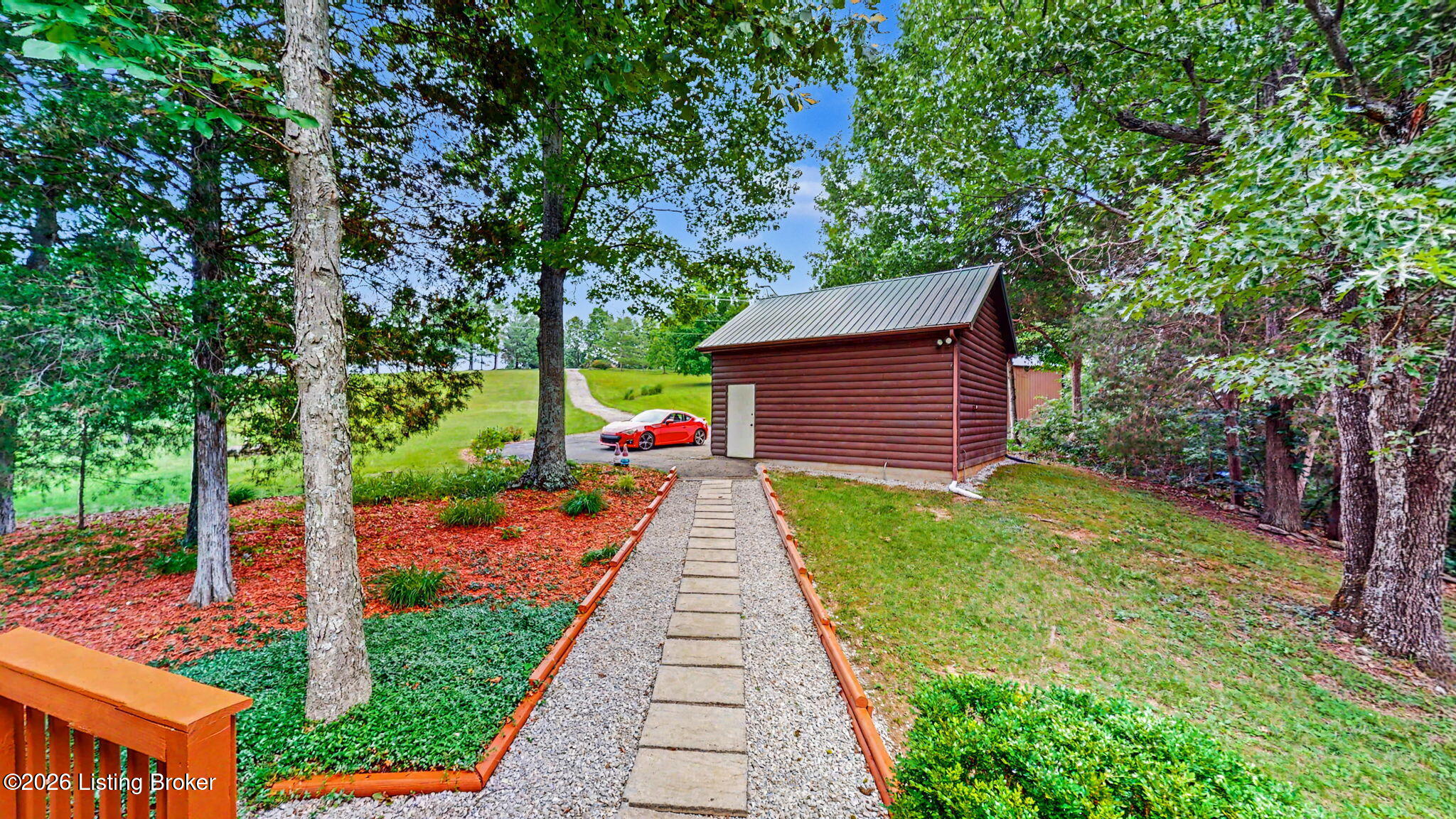 2615 Morton Ridge Road Bedford, KY 40006 - Photo 7 of 42 View from the pergula out to the one of the detached garages