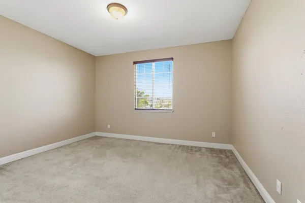 a view of a back yard of the house