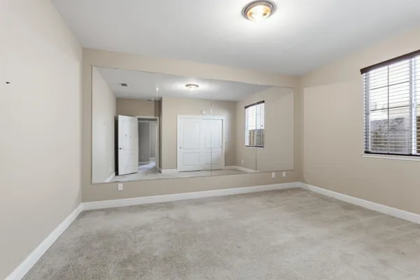 an aerial view of a house with sitting space
