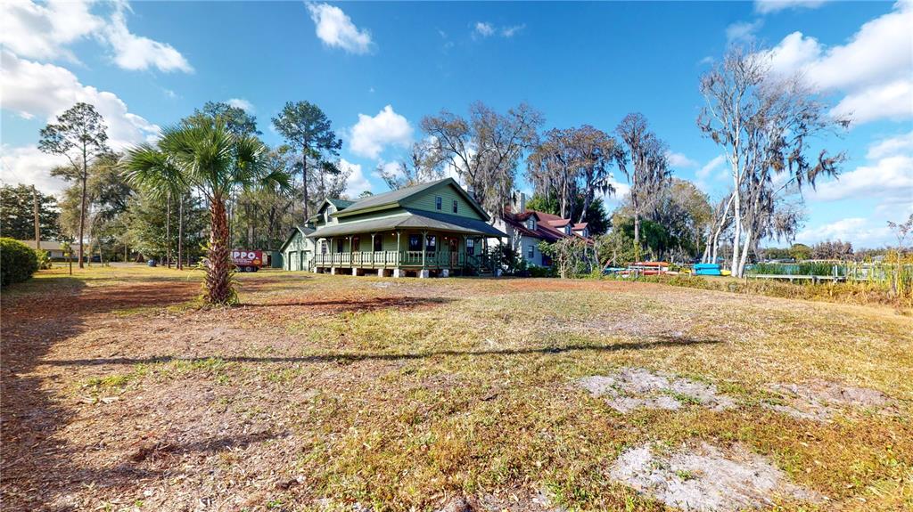 19803 Reading Road Lutz, FL 33558 - Photo 10 of 48 a view of road with large trees