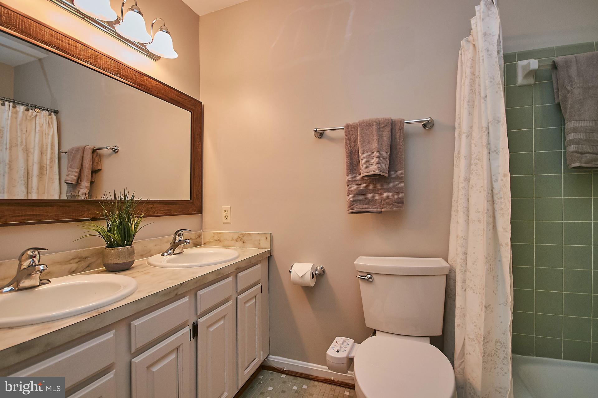 1624 8th Place McLean, VA 22101 - Photo 22 of 29 Hall Bath with 2 sinks and bathtub/shower