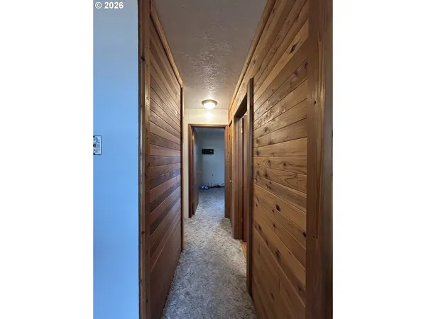 a view of hallway with stairs