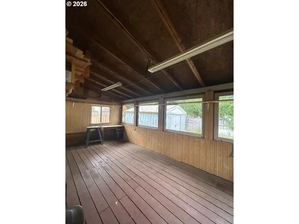 a view of a floor to ceiling window and yard