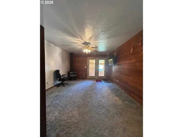 a view of livingroom and a window