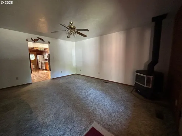 a view of a living room with a bathroom