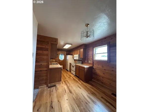 a kitchen with granite countertop lots of counter top space