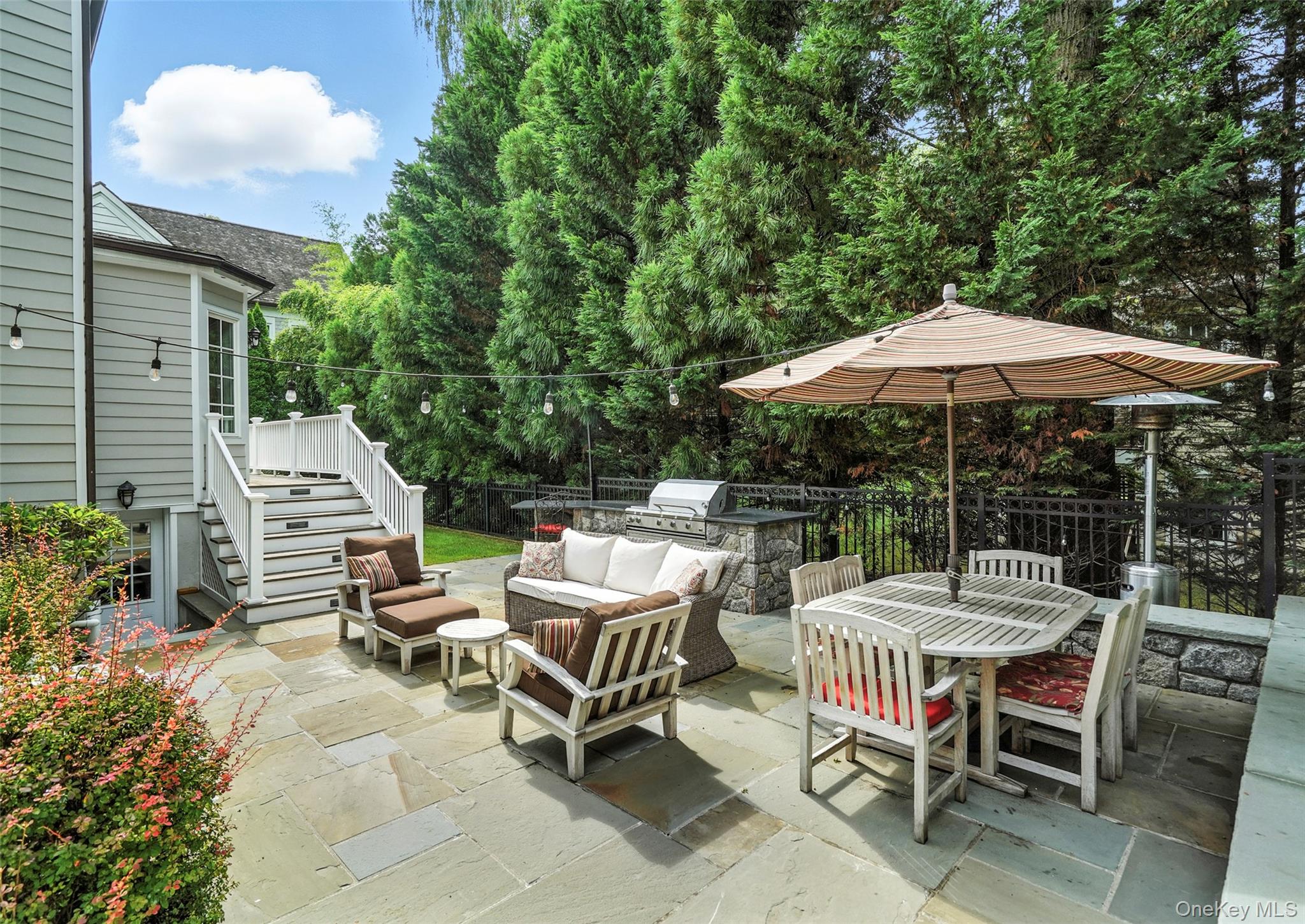 52 Intervale Place Rye, NY 10580 - Photo 21 of 26 a view of backyard with seating space and plants