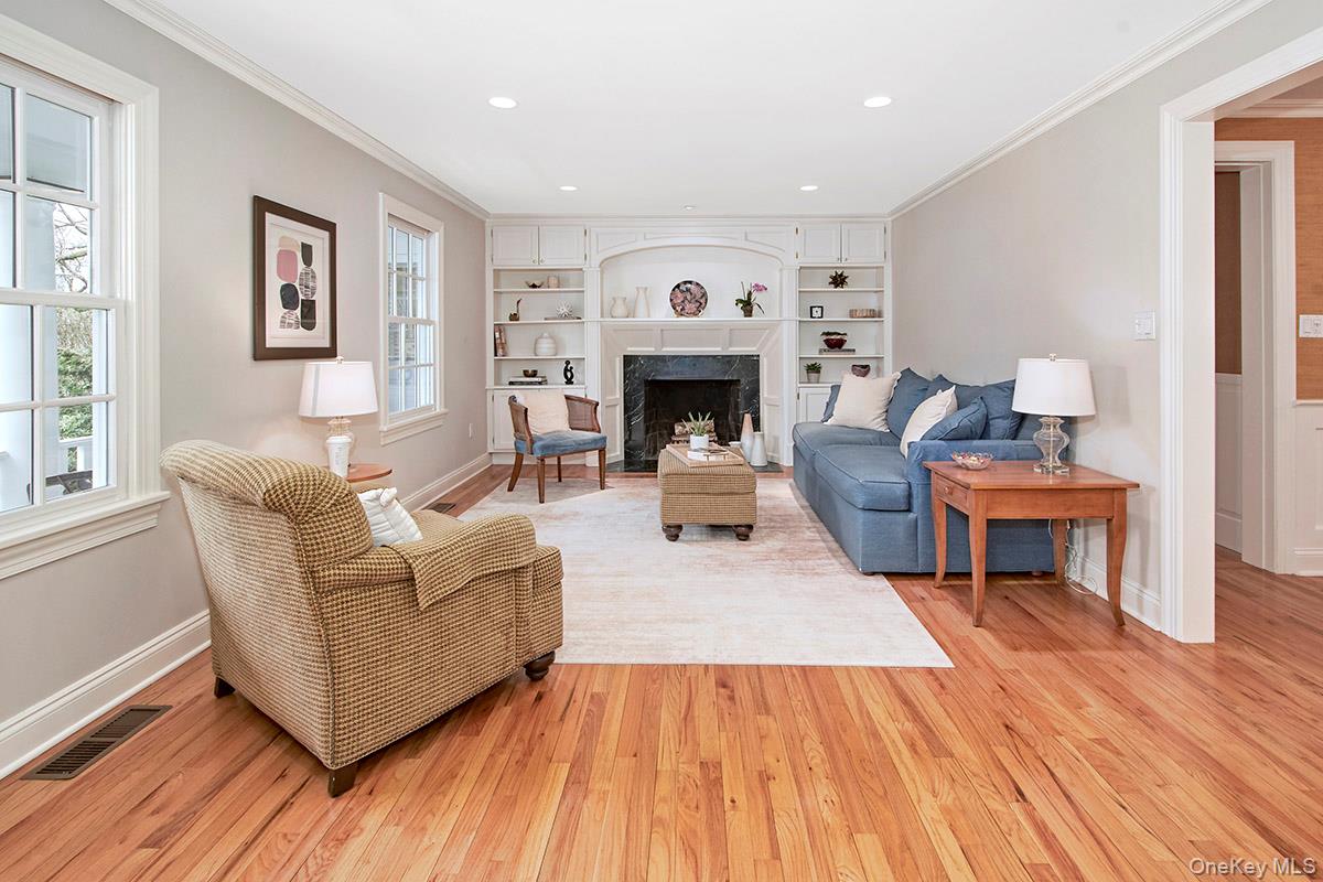 52 Intervale Place Rye, NY 10580 - Photo 3 of 26 a living room with furniture and a fireplace