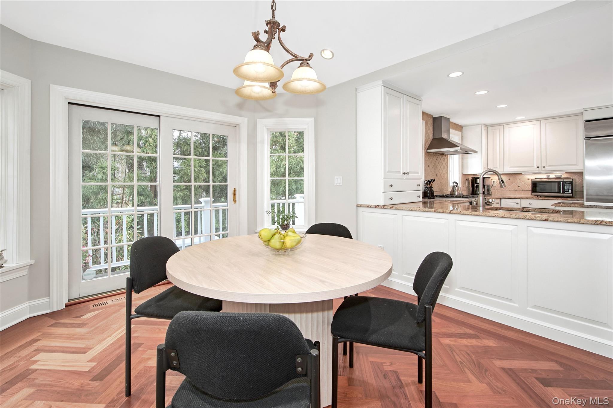 52 Intervale Place Rye, NY 10580 - Photo 8 of 26 a view of a dining room with furniture window and wooden floor