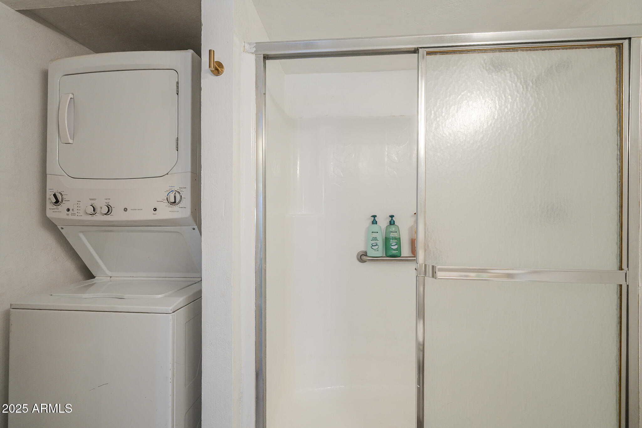 12123 West Bell Road, Unit 260 Surprise, AZ 85378 - Photo 21 of 29 a bathroom with a shower