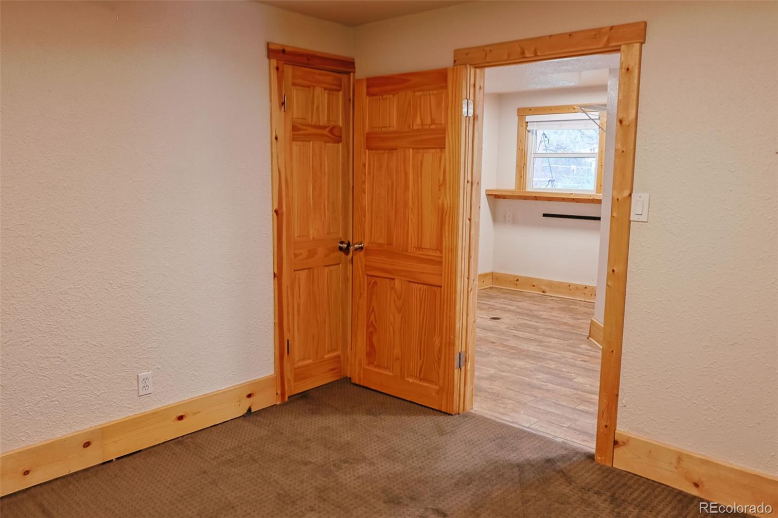 5237 South Olive Road Evergreen, CO 80439 - Photo 23 of 31 an empty room with closet area