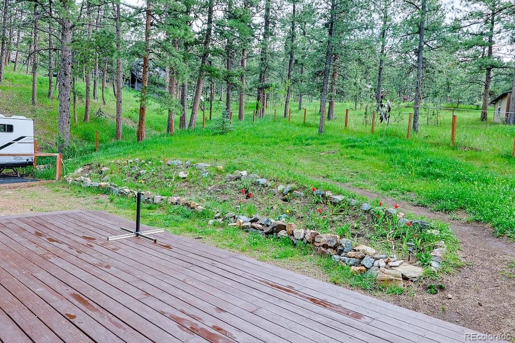 5237 South Olive Road Evergreen, CO 80439 - Photo 28 of 31 a view of a park with large trees
