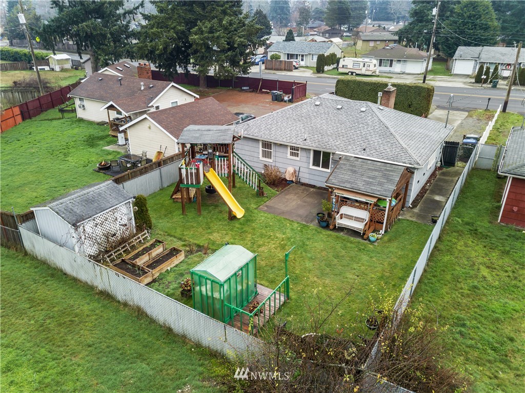 8216 Custer Road Southwest Lakewood, WA 98499 - Photo 16 of 20 an aerial view of a house with garden