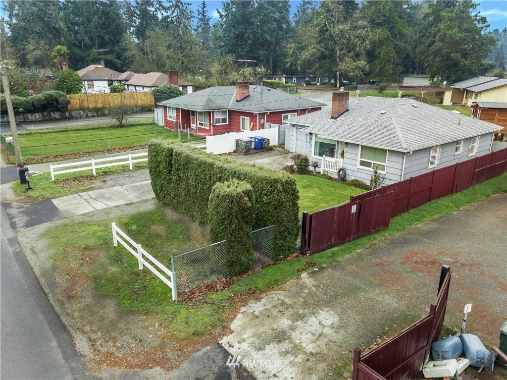 8216 Custer Road Southwest Lakewood, WA 98499 - Photo 19 of 20 an aerial view of a house with swimming pool