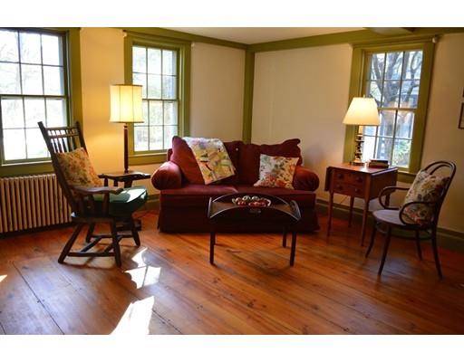 27 Whitney Road Stow, MA 01775 - Photo 15 of 24 a living room with furniture and a wooden floor