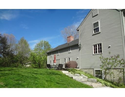 27 Whitney Road Stow, MA 01775 - Photo 6 of 24 a view of a house with a backyard