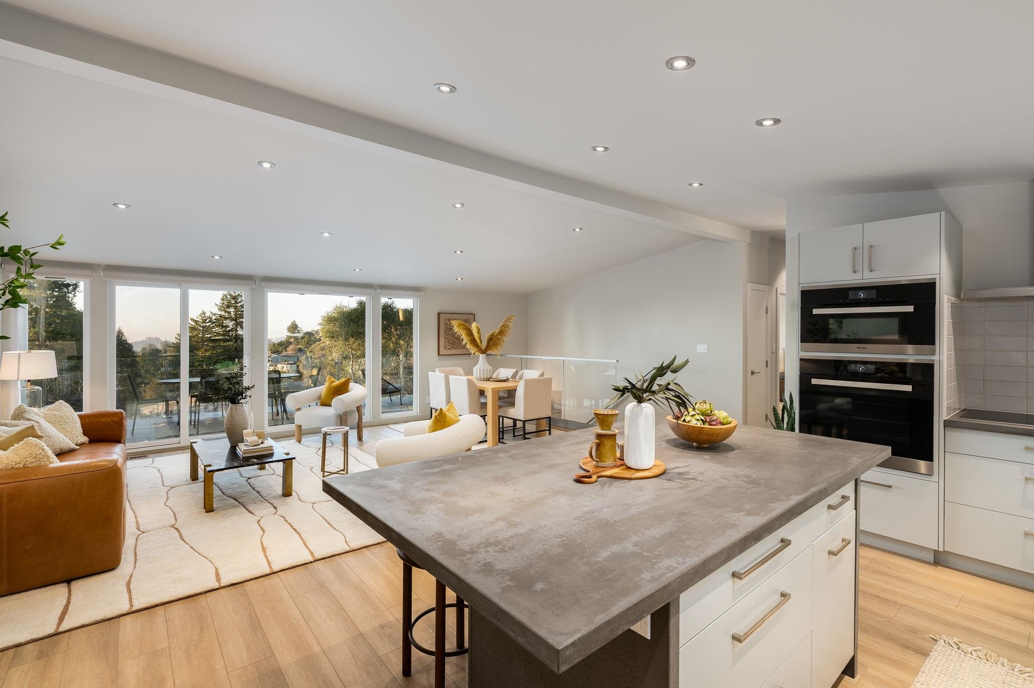 1468 Summit Road Berkeley, CA 94708 - Photo 55 of 59 Kitchen featuring open floor plan, white cabinetry, stainless steel double oven, recessed lighting, and light wood finished floors