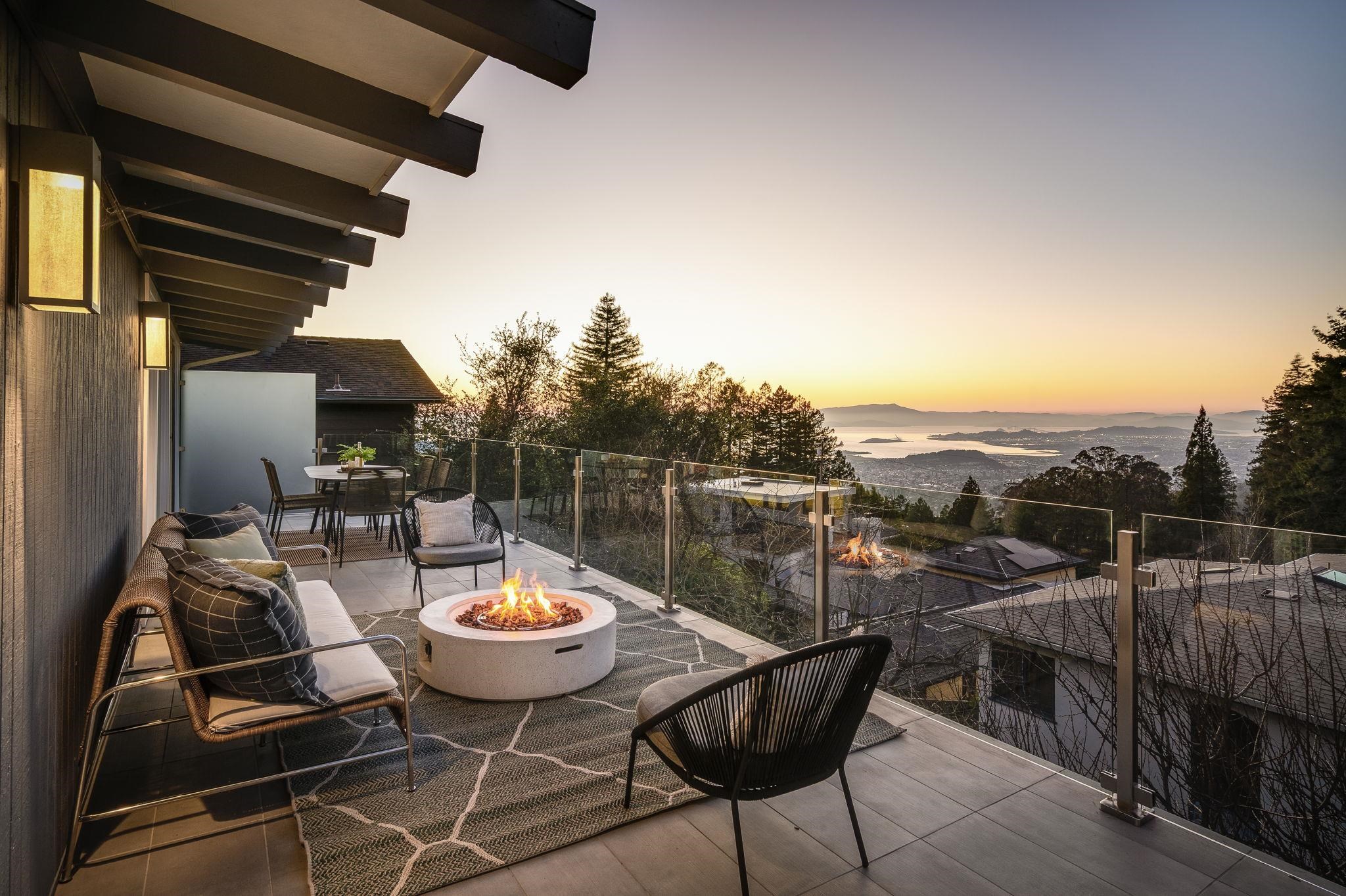 1468 Summit Road Berkeley, CA 94708 - Photo 38 of 59 Balcony at dusk featuring an outdoor fire pit, a patio area, and outdoor dining area