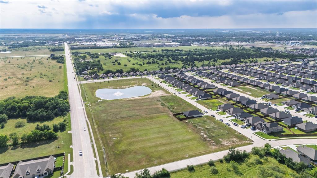 0 Traders Road Greenville, TX 75402 - Photo 18 of 37 an aerial view of residential houses with outdoor space
