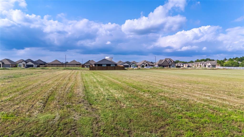 0 Traders Road Greenville, TX 75402 - Photo 25 of 37 a view of a lake with houses in the back