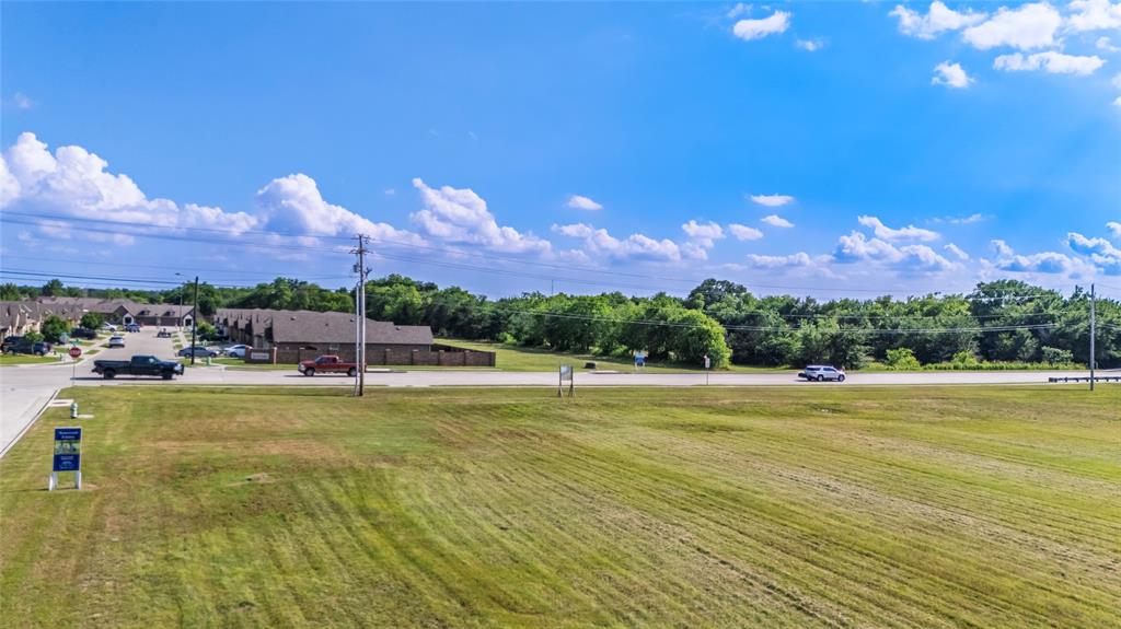 0 Traders Road Greenville, TX 75402 - Photo 26 of 37 a view of a swimming pool with an outdoor space and seating area