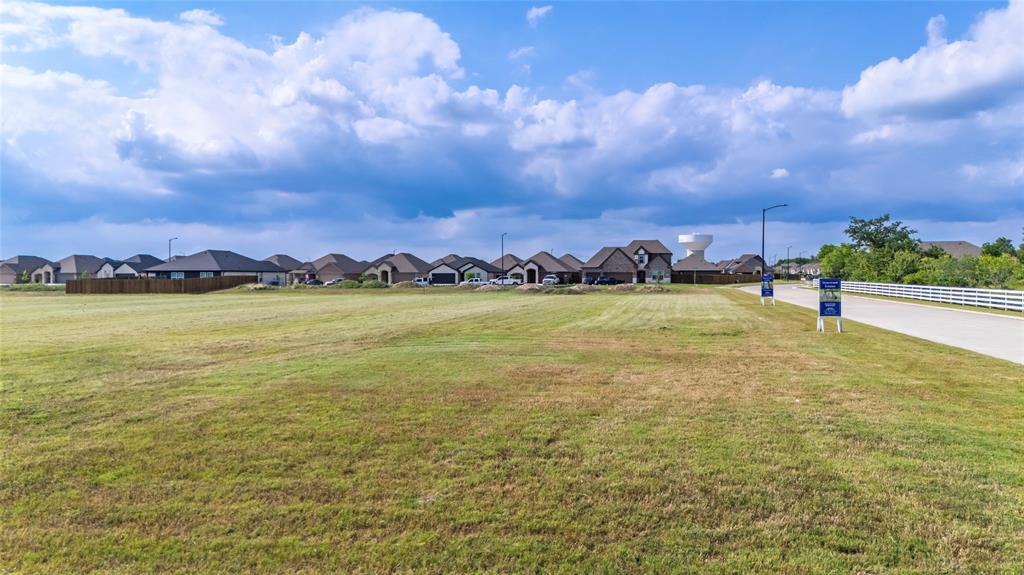 0 Traders Road Greenville, TX 75402 - Photo 35 of 37 a view of a lake with houses in the back