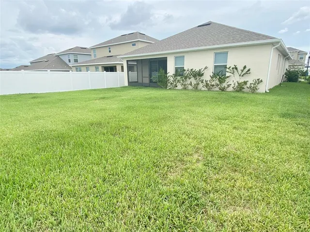 a view of a house with garden