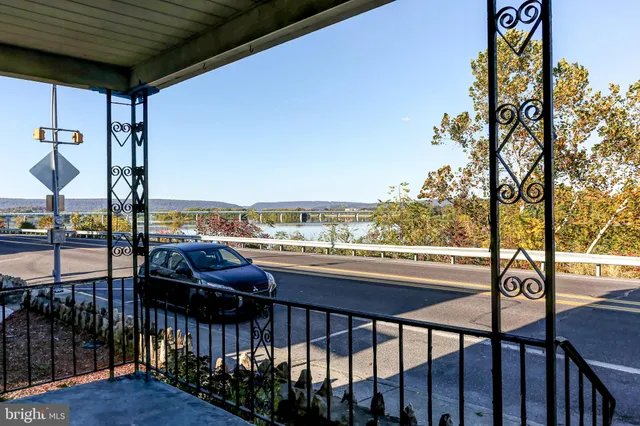 a view of swimming pool from a balcony