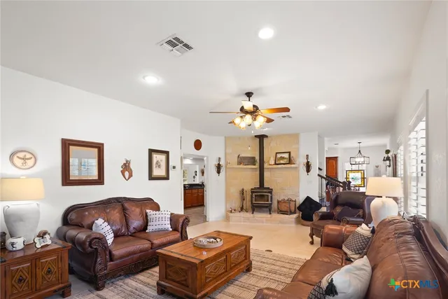 a bedroom with bed and a window