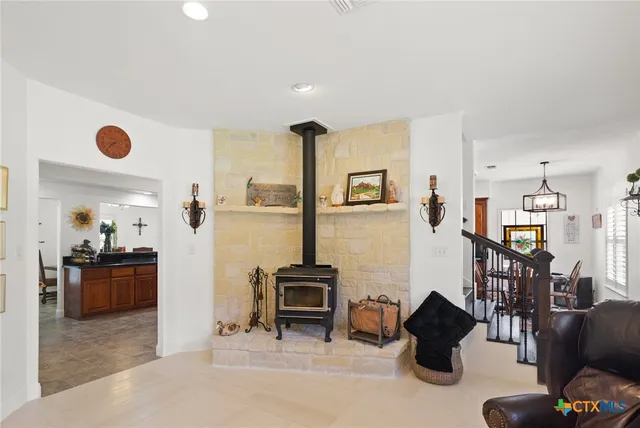 a large bathroom with a double vanity sink and mirror with shower