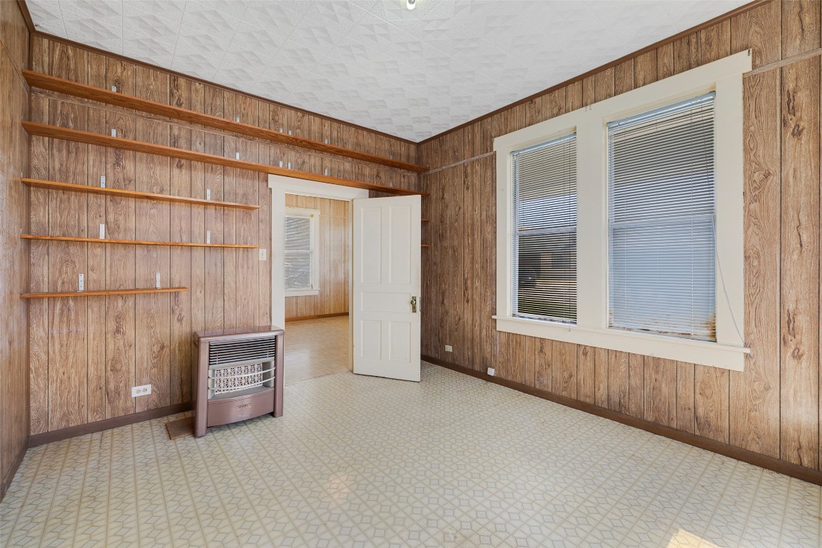 303 Vernon Street Taylor, TX 76574 - Photo 22 of 37 Bedroom with heating unit