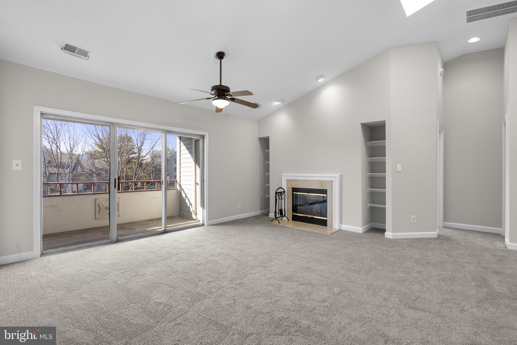 13701 Modrad Way, Unit 31 Silver Spring, MD 20904 - Photo 6 of 29 Living Room with Vaulted Ceiling