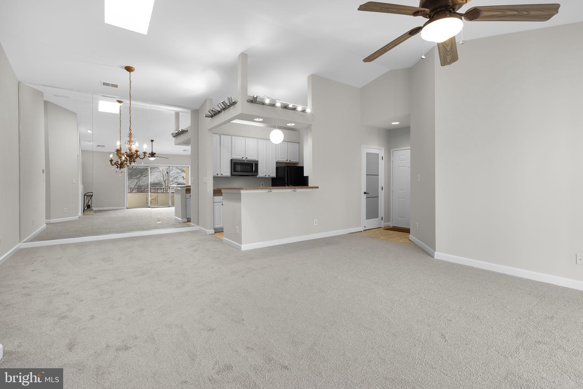 13701 Modrad Way, Unit 31 Silver Spring, MD 20904 - Photo 8 of 29 Living Room, Dining Area and Kitfhen