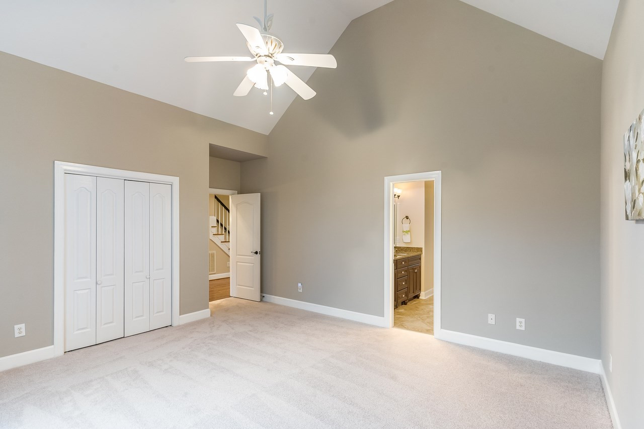 3712 Evander Way Raleigh, NC 27613 - Photo 5 of 13 FIRST FLOOR owners suite has vaulted ceilings, NEW CARPET and lots of privacy. Owners Suite