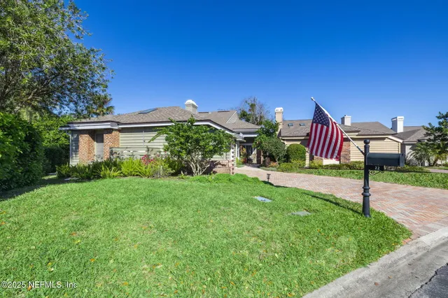 a view of house with outdoor space and street view