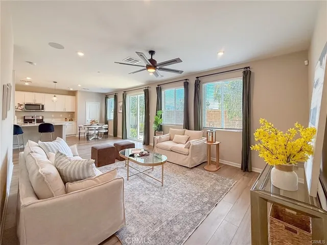 a bedroom with a large bed and a couch