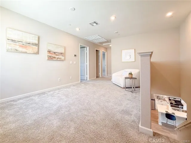 a spacious bathroom with a tub shower and sink